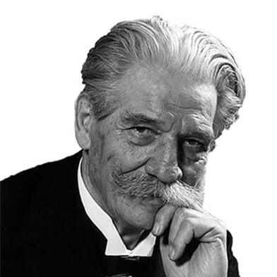 Black and white image of smiling Albert Schweitzer (1875-1965) in his later years